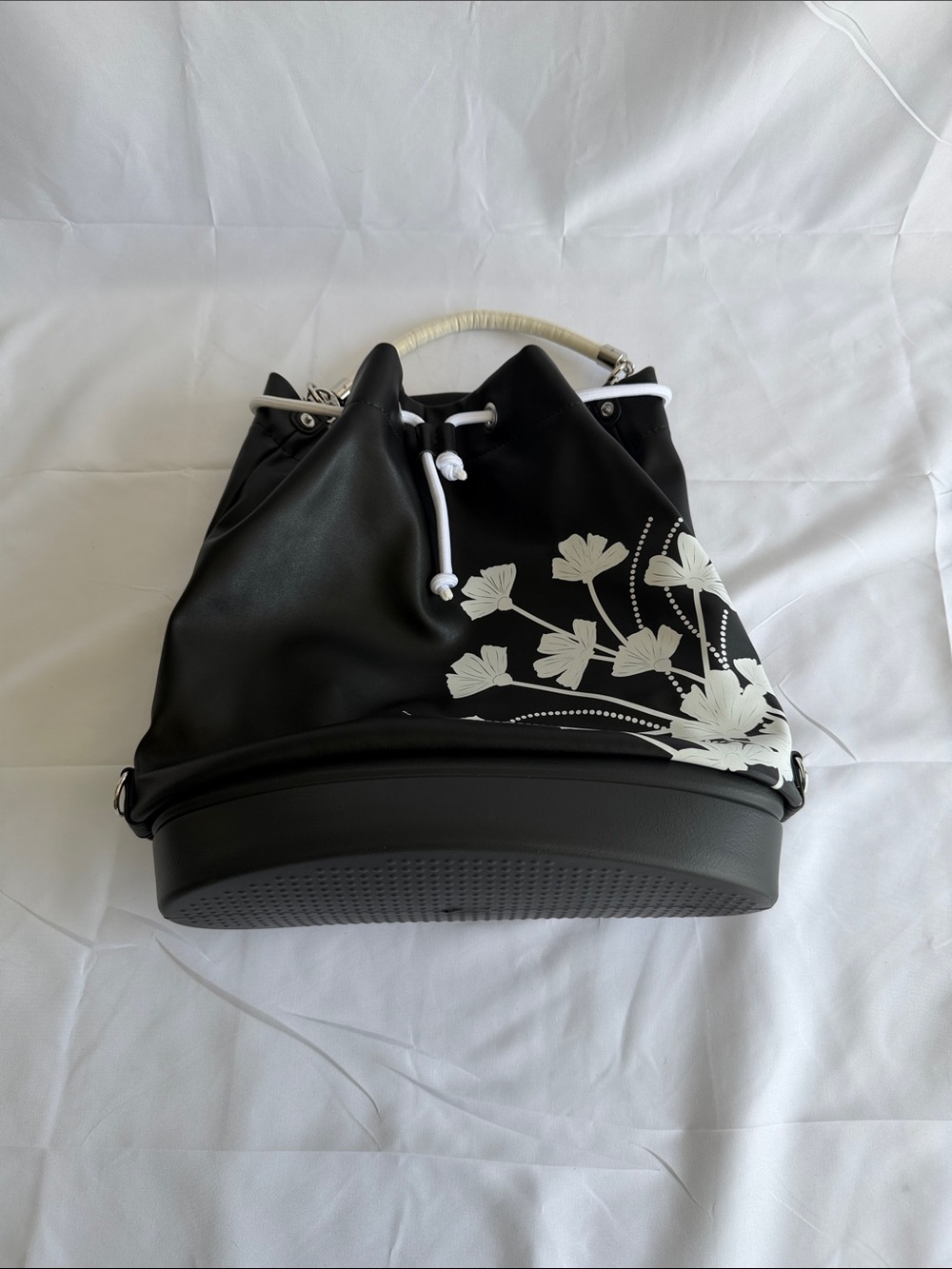 Black Floral Drawstring Shoulder Bag with White Accents